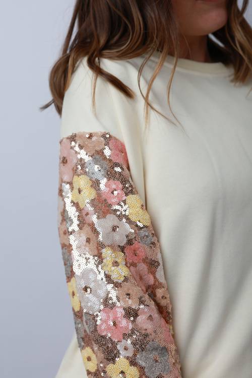 Pull écru à sequins